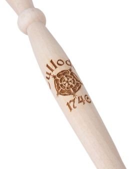 An image of a close up of a wooden spurtle displaying a Jacobite rose, and says Culloden 1746. 